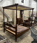 A George III style pine four poster bed frame, width 140cm, length 204cm, height 204cm