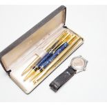 A Sheaffer fountain pen, a Parker pen and pencil pair, one other ballpoint pen and a gent's Tissot