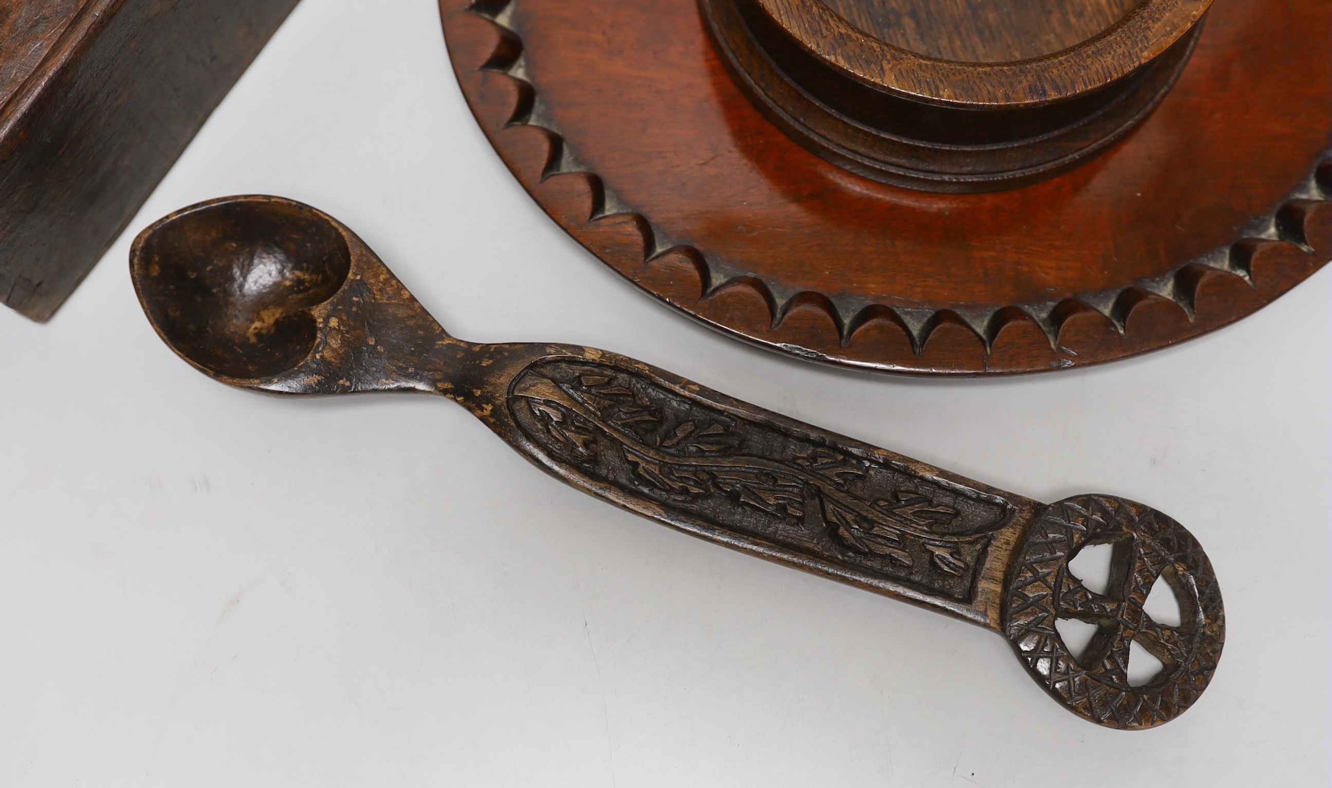 Treen including carved love spoon, four section box with incised decoration and a coaster, the - Image 2 of 5