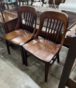 A pair of early 20th century mahogany office chairs, width 48cm, depth 43cm, height 86cm