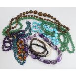 A group of assorted bead necklaces