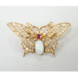 A yellow metal ruby, white opal and seed pearl cluster set bug brooch, width 48mm, gross weight 7