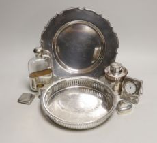 A George V silver small compact, a silver mounted timepiece, small silver tot and silver heart
