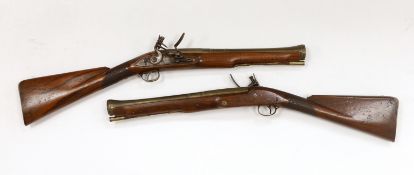 A pair of reproduction 'York Mail' flintlock blunderbusses in a late 18th century style. Brass