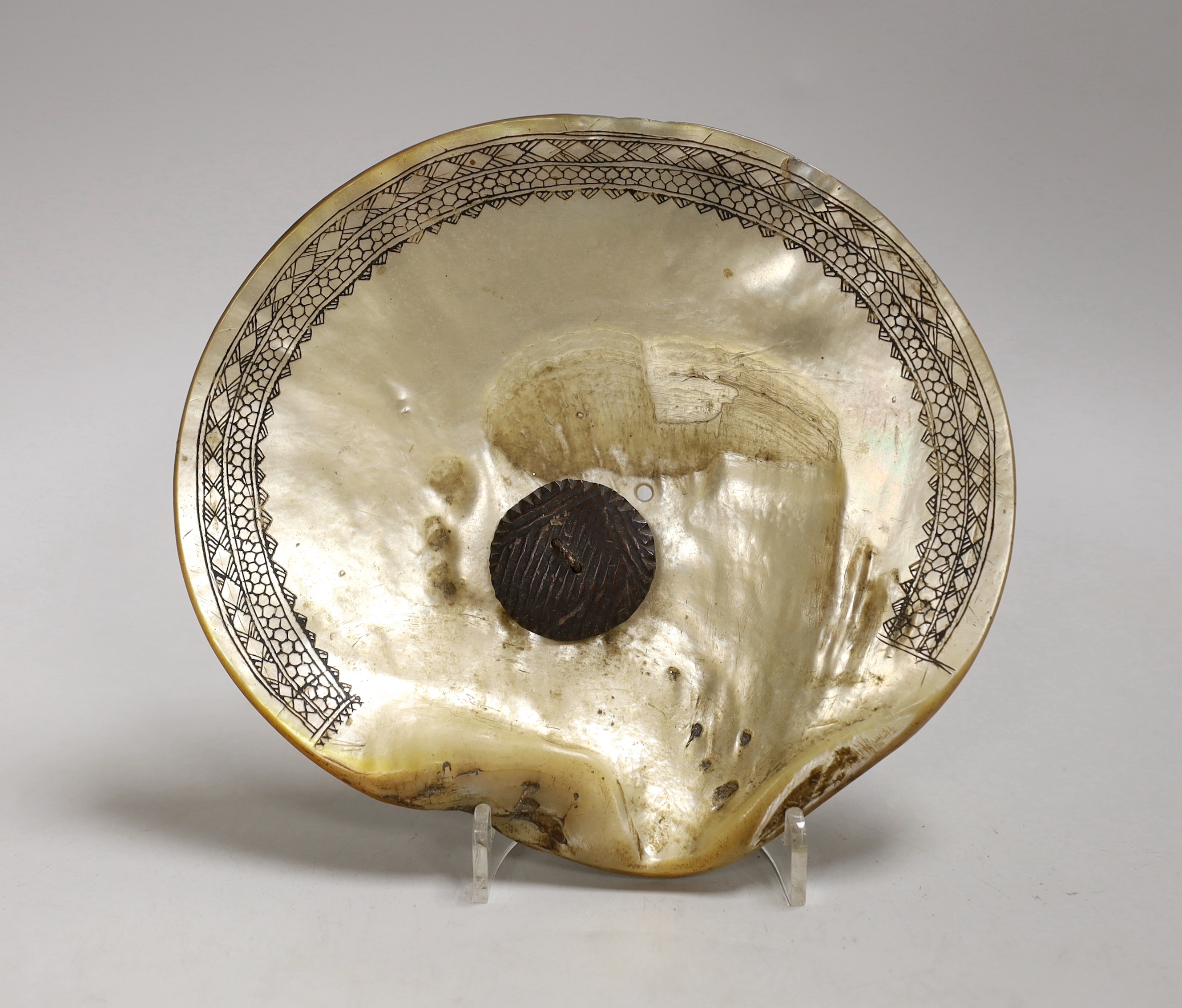 Bontoc Tribe, Luzon, North Island Philippines, a fikum hip decoration, engraved mother of pearl