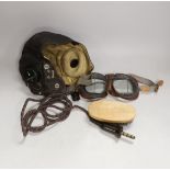 A WWII RAF flying helmet with speaker earpieces and original cables and plugs, Ref No.10A/13466,