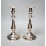 A pair of continental white metal candlesticks, stamped SK 900, height 25.3cm, gross 18.3oz.