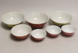 Five Chinese pink monochrome bowls decorated with dragons chasing the flaming pearl together with
