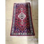 A North West Persian part silk mat, 60cm x 45cm