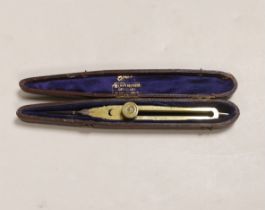 A 19th century brass and steel proportional compasses, Elliott Bros., 30 The Strand, engraved WCC,