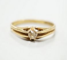 A n 18ct gold and claw set solitaire diamond ring, size P, gross weight 3 grams.
