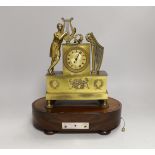 A 19th century French musical mantel timepiece, the dial inscribed Albert A Paris, the mahogany base