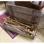 A vintage pine cased croquet set