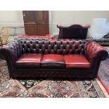 A Thomas Lloyd buttoned burgundy leather Chesterfield sofa, length 200cm, depth 85cm, height 72cm,