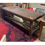 A late 19th century French oak refectory dining table with 'X' stretcher, length 210cm, width