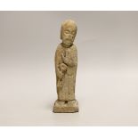 A limestone figure of Saint Peter, possibly Norman period 21cm