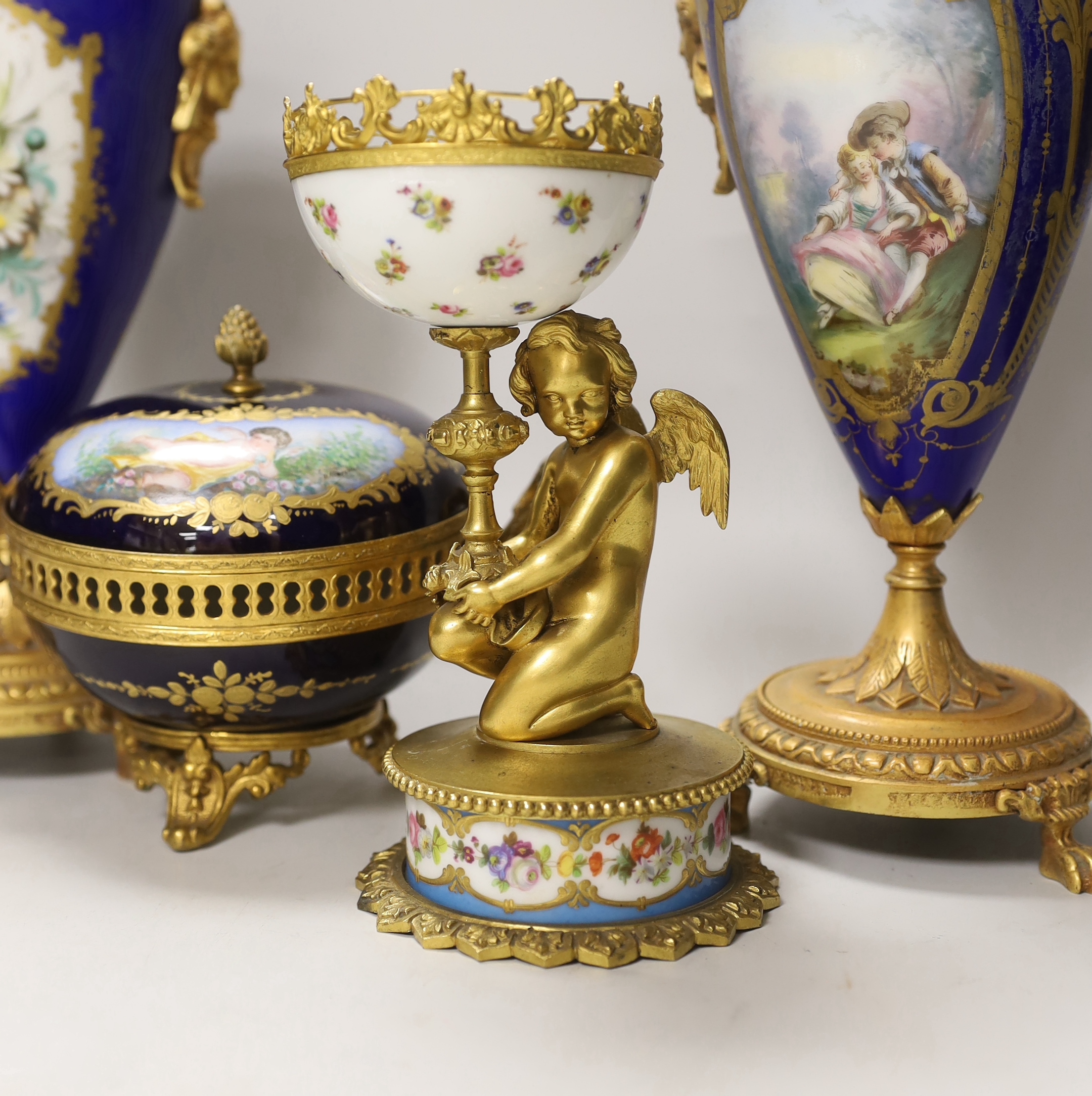 A pair of Sevres style porcelain ormolu mounted vases, a similar putti stemmed cup and a bowl and - Image 2 of 6