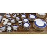 Coalport Athlone Blue dinnerware including cups and saucers, twin handled bowls and plates,