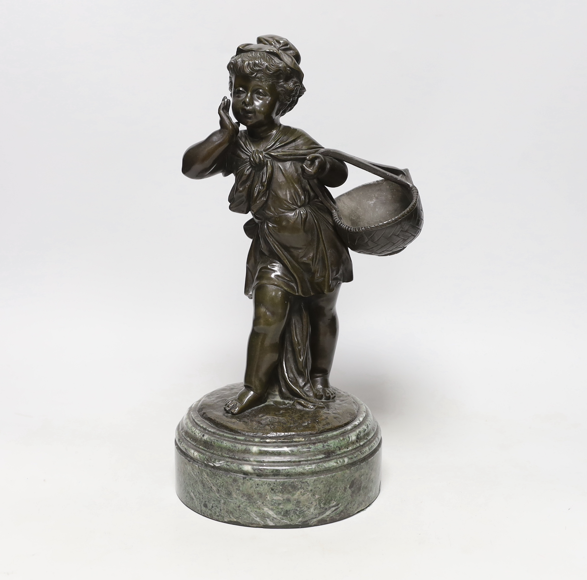 A 19th century bronze figure of a female seller on marble base, 37cm tall