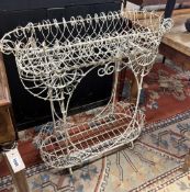 A Victorian painted wirework two tier pot stand, width 79cm, height 82cm