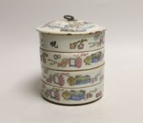 An early 20th century Chinese four section food container hand painted in the famille rose