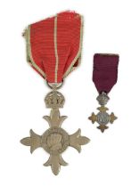 A cased George V military MBE containing leaflet with instructions as to wearing Insignia,