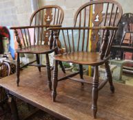 A near set of four 19th century Nottingham area elm, ash and beech Windsor elbow chairs, possibly by