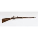 A two band percussion Military carbine of Indian use, regulation brass mounts, fold leaf rear sight,