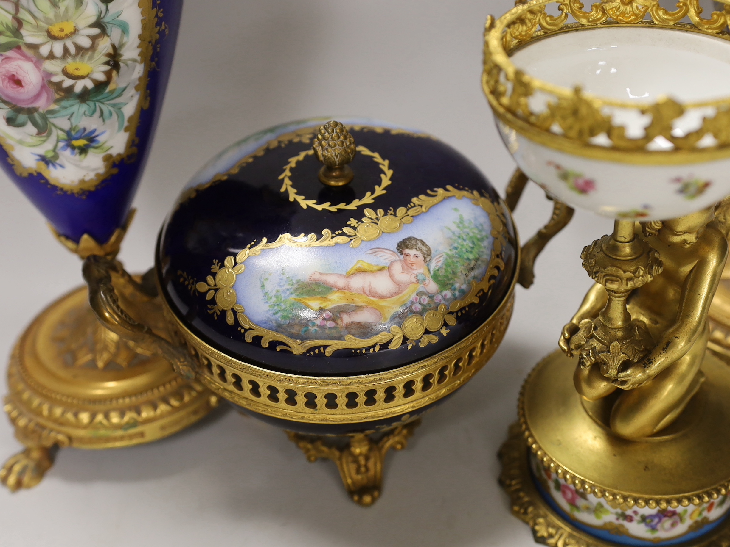 A pair of Sevres style porcelain ormolu mounted vases, a similar putti stemmed cup and a bowl and - Image 3 of 6