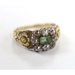 A 19th century yellow metal, foil backed emerald and diamond set rectangular cluster ring, with