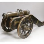 A bronze starting canon and truck, barrel 37cm