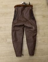 A pair of WWII Air Ministry issue RAF sheepskin breeches, with original label stating; ‘AM, Size: 5,