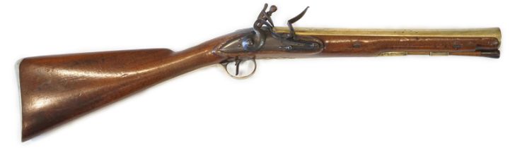 An English brass barrel flintlock blunderbuss by H W Mortimer, late 18th century, flared brass