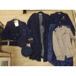 A collection of post-war RAF uniforms, comprising; two caps, double-breasted overcoat, dress uniform