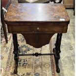 A Victorian figured walnut rectangular sewing / games table, width 58cm, depth 41cm, height 69cm