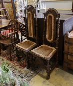 Two 18th century oak high back dining chairs, larger height 128cm