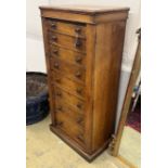 A Victorian oak eight drawer Wellington chest, width 60cm, depth 38cm, height 127cm