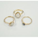 Three assorted yellow metal and single stone labradorite? set rings, gross weight 5.1 grams.