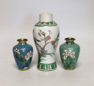 A Chinese famille verte small vase and a pair of cloisonné enamel vases, tallest 18cm high