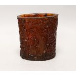 A Chinese amber coloured moulded plastic brush pot, 13.5cm