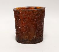 A Chinese amber coloured moulded plastic brush pot, 13.5cm