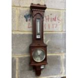 A Victorian walnut cased aesthetic movement style aneroid barometer and thermometer, Negretti &