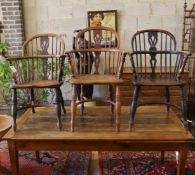 Three 19th century Nottingham area Windsor ash and elm elbow chairs with crinoline stretchers,