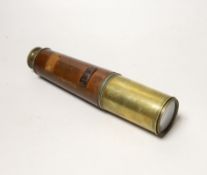 A WWI three draw brass telescope with sun shade and leather outer cover by Taylor Taylor Hobson