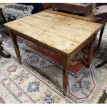 A small Victorian rectangular pine kitchen table, single frieze drawer, width 103cm, depth 71cm,