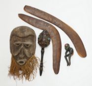 Two Aboriginal boomerangs, an African mask, a painted lion figure and four other items (8)