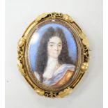 A Georgian yellow metal mounted oval portrait watercolour of a gentleman, with acorn and leaf