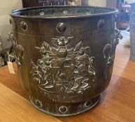 A 19th century Dutch embossed copper coal bin, diameter 49cm, height 45cm