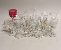 A quantity of antique and later glasses including a Georgian dwarf ale glass and Victorian cranberry