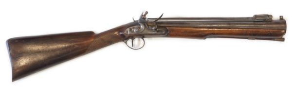 An iron barrelled flintlock blunderbuss by Goodwin of London, fitted with a top spring bayonet, lock